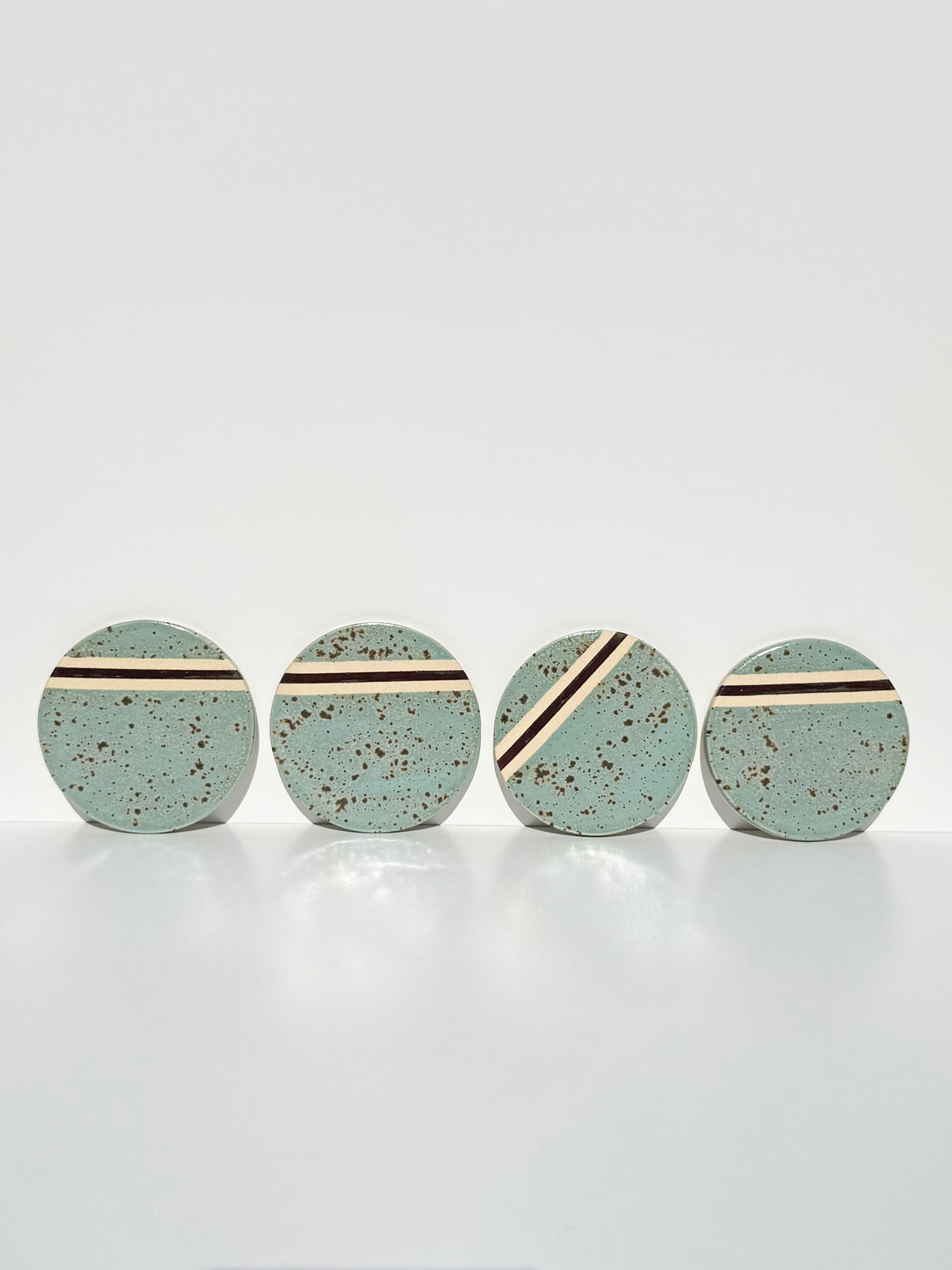 Cenote with Blackened Copper Stripe Coasters