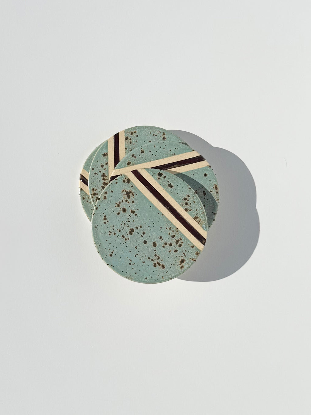 Cenote with Blackened Copper Stripe Coasters